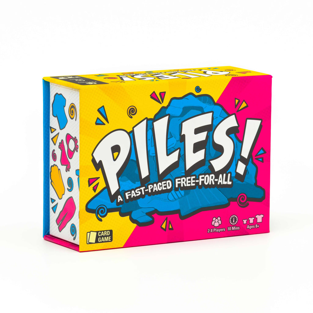 The colorful packaging box of the card game 'Piles!' on a clean white background. Family game. party game. for all ages. game night. couples game.
