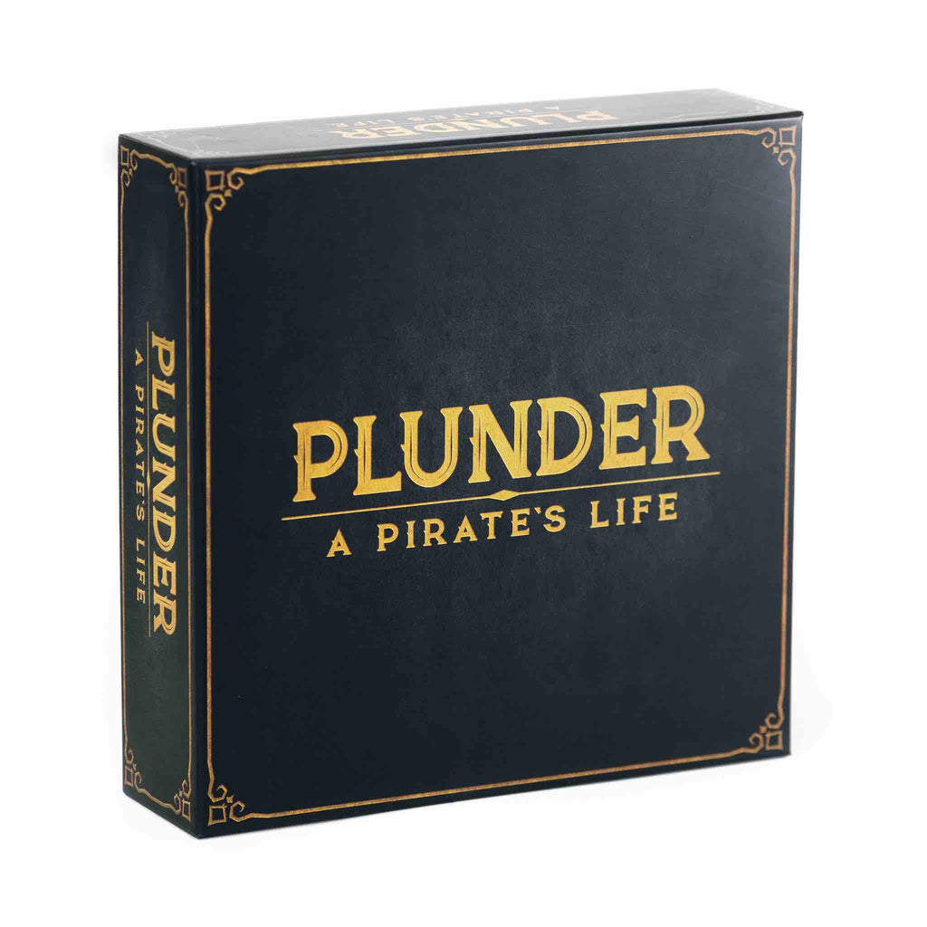 A boxed board game titled 'Plunder: A Pirate's Life' with a dark background and gold accents. Family Game. Game Night.
