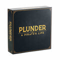 A boxed board game titled 'Plunder: A Pirate's Life' with a dark background and gold accents. Family Game. Game Night.
